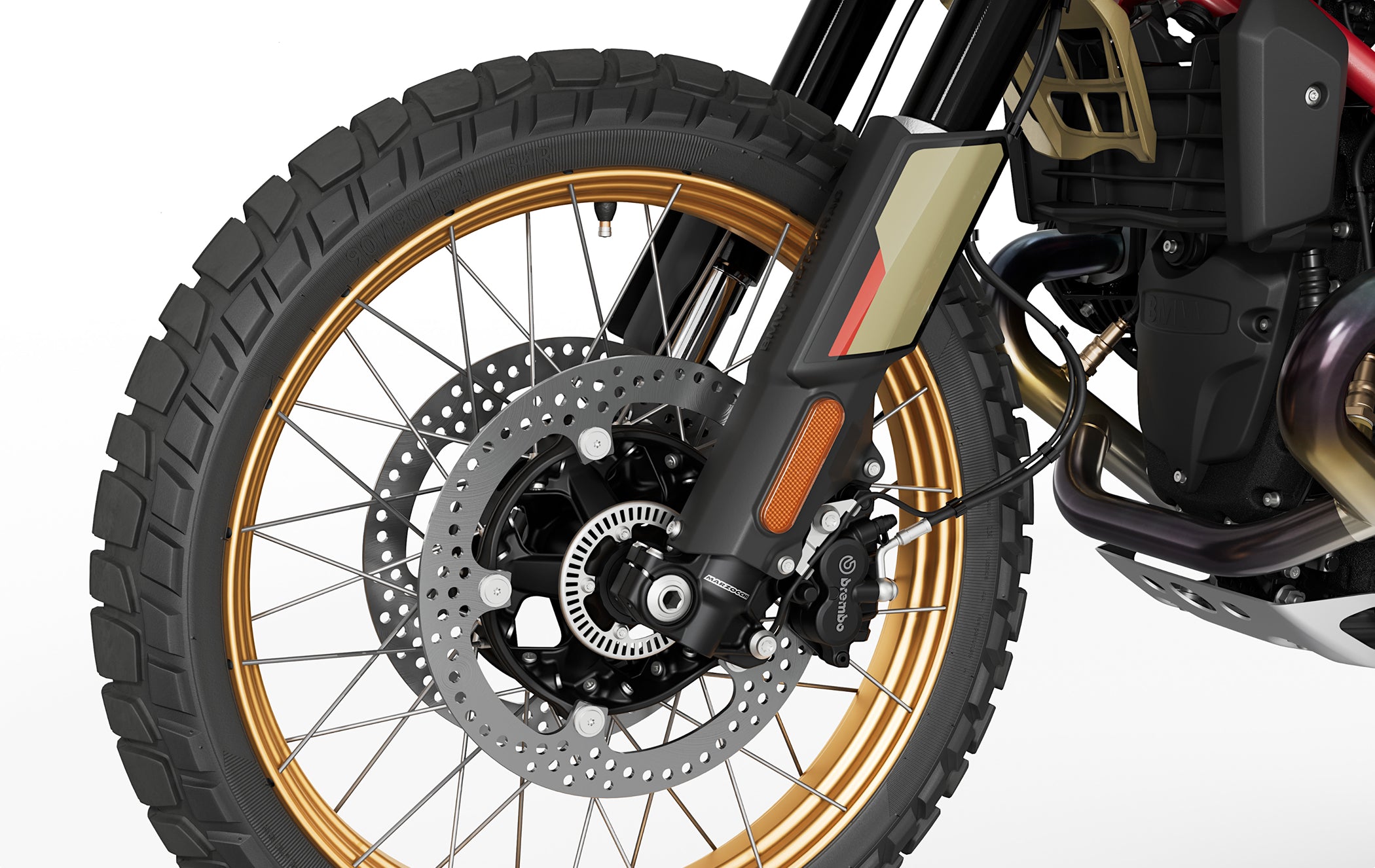 Adventure motorcycle front wheel with Marzocchi fork, Brembo brake caliper, ABS rotor, and spoked rim.