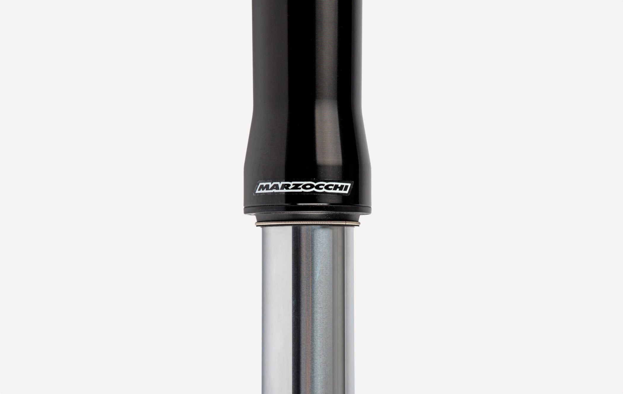 Marzocchi motorcycle front fork upper tube and stanchion assembly for performance suspension systems.